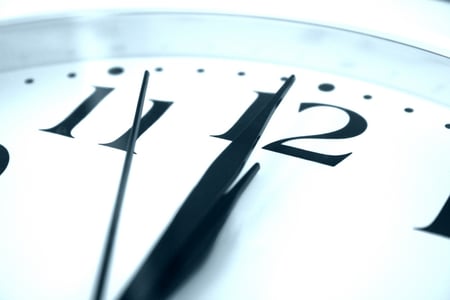 Clock showing almost midnight